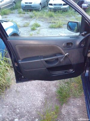 Dezmembrez Ford Fiesta 1.4 tdci an 2003 - imagine 10