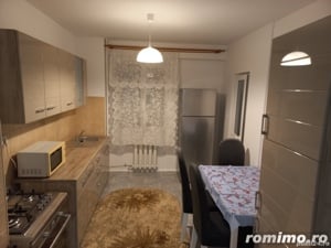 inchiriere un apartament situat la etajul 4 pe strada Bucuresti - imagine 2