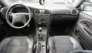 Dezmembram VOLVO V40 1.8 benzina cod motor: B4184S 115CP an 1995-1999 - imagine 7