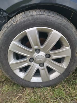 Vind piese din dezmembrare Mitsubishi Colt 1.1 benzina 2013 109000 km avariata avariat frontal - imagine 9