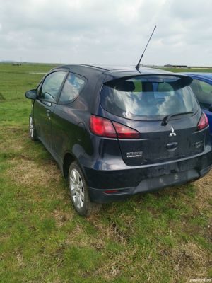 Vind piese din dezmembrare Mitsubishi Colt 1.1 benzina 2013 109000 km avariata avariat frontal - imagine 6