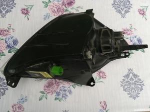 Far for stanga de ford fiesta ghia 2002 ,se potrivesc piesele  pana la cele din 2008 - pret 120  ron - imagine 2