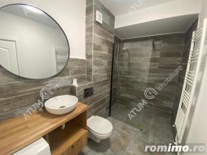 Apartament cu 3 camere 2 bai si loc de parcare in Sibiu - imagine 17