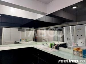 Penthouse de inchiriat 244 mp modern mobilat si utilat terasa Sibiu - imagine 10