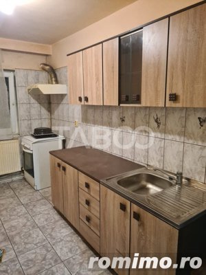 Apartament 65 mp 4 camere decomandate balcon  Piata Noua Cisnadie