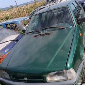 Dezmembrez dacia solenza 14 benzina 2005