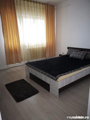 vanzare un apartament 2 camere decomandat zona Modern - imagine 2