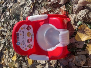 oliță de culoare roșie 