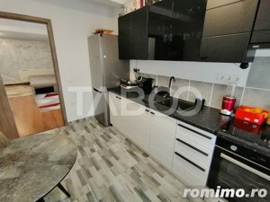 Apartament decomandat 4 camere 2 bai 2 parcari 3 balcoane 132 utili  - imagine 11