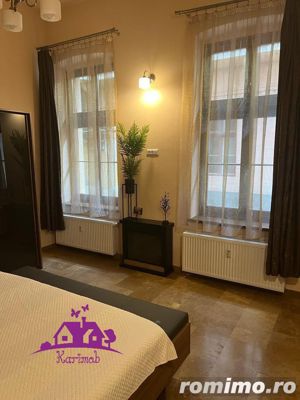 Apartament ultracentral de vanzare sau inchiriere - imagine 7