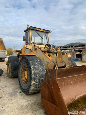 Dezmembrez Caterpillar 960 F - imagine 5