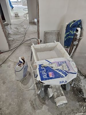 Echipă zugravi, glet mecanizat 