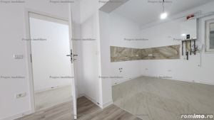 Apartament 2 camere decomandat - terasa 9 mp - etaj 1 - 80.000 euro 