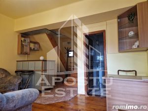 Casa familiala cu spatiu comercial si garaj P+1E+M 720 Mp - imagine 9