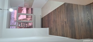 executam finisaje interioare.  - imagine 10