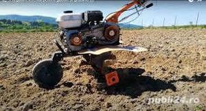 Dam cu Motosapa  Sapam cu motosapa