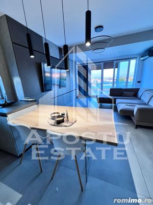 Penthouse cu 3 camere si 2 bai, terasa de 70 mp si 2 locuri de parcare - imagine 2