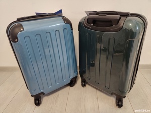 Troler, bagaj de mana, cabina ABS plastic cu 4 roti mobile 360 grade detasabile.