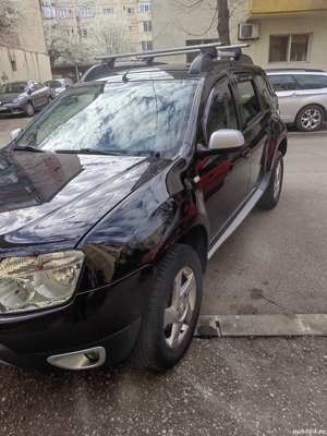 Dacia Duster 1.5dci 110cp - imagine 4