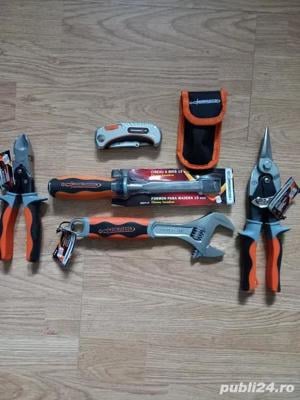 MAGNUSSON,NOI,Briceag lama+cutter,patent taiere laterala,foarfeca tabla,dalta lemn,cheie reglabila 