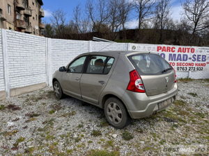 Dezmembrez Dacia Sandero 1.6 benzina 2009 - imagine 6
