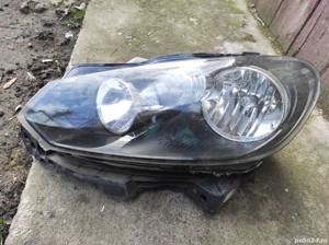 far vw golf 6/5 stanga/suport far dreapta