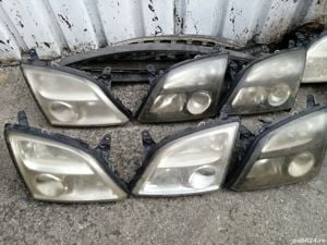 faruri Opel Vectra C 100 lei