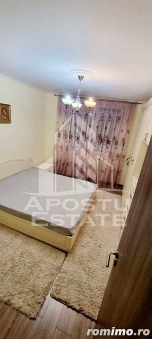 Apartament cu 3 camere,100 mp,decomandat,etaj intermediar,zona Intim - imagine 2