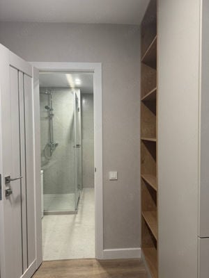 vanzare un apartament de doua camere in zona Baba Novac - imagine 2