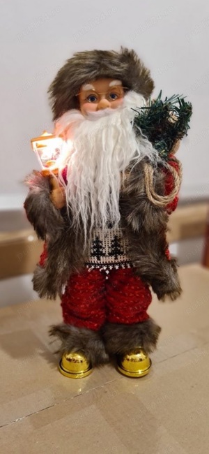 Mos Craciun cantaret 40 cm. 2 Modele.