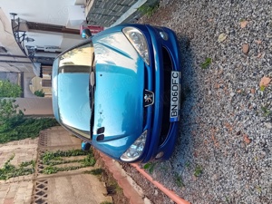 Volan dreapta ,inmatriculata - imagine 3