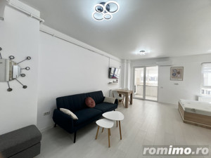 Garsonieră modernă de închiriat în Central Address cu parcare