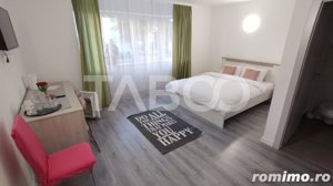 Casa 3 nivele avand etajele 1 si 2 in regim hotelier Strand - imagine 10