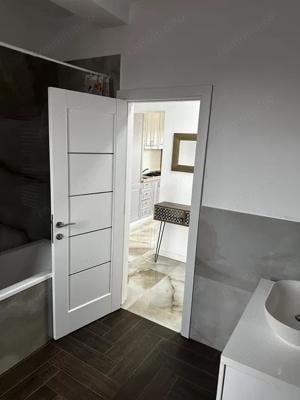 2 cam 63 mp utili+pod deasupra apartamentului loc parcare mobilat zona Braytim-Muzicescu - imagine 2