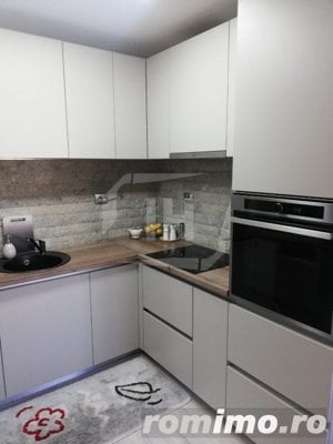 Apartament cu 3 camere, mobilat si utilat, zona Piata 1 Mai - imagine 5