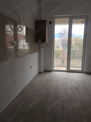 Apartament 2 camere, decomandat, zona Biruintei, finisaje premium, incalzire in pardoseala - imagine 3