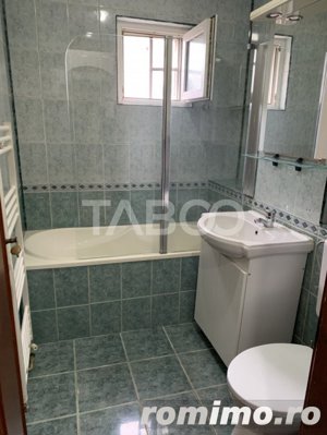 Apartament decomandat 3 camere parter pivnita 60 mpu in Vasile Aaron - imagine 6