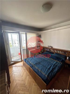 Apartament 3 camere si 2 bai, decomandat, zona Dacia, mobilat si utilat+loc de parcare - imagine 3