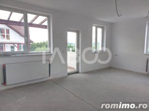 Apartament spatios bloc nou 3 camere  96 mp zona linistita in Cisnadie - imagine 3