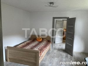 Casa individuala 120 mp deosebita teren 1000 mp la 45 km de Sibiu - imagine 15