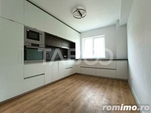 Apartament la parter inalt cu 3 camere si bucatarie separata - imagine 4