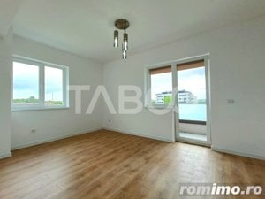 Apartament la parter inalt cu 3 camere si bucatarie separata - imagine 2