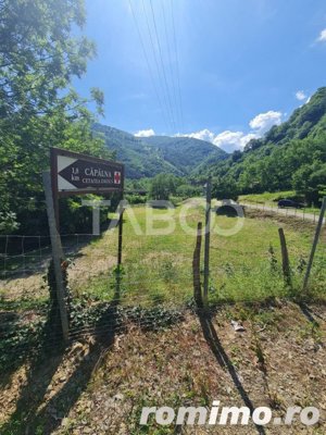 Teren intravilan cu iesire la rau de vanzare pe Transalpina - imagine 5