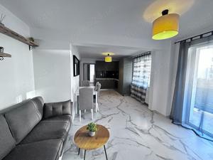 Apartament de 3 camere, se vinde cu preluare de chiriasi - imagine 2