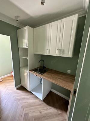 Montaj usi, parchet, riflaje si mobilier.