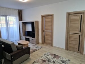 Închiriez apartament cu 2 camere etajul I - imagine 2