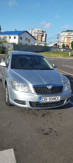Vând SKODA OCTAVIA 2 face lift 1.6 diesel  - imagine 2 Vând SKODA OCTAVIA 2 face lift 1.6 diesel  - imagine 2