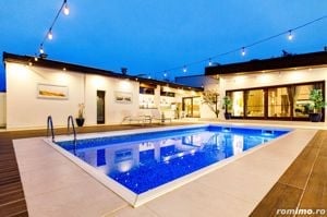 Arhitectura Distinsa: Casa Moderna Plan Parter si Piscina Privata