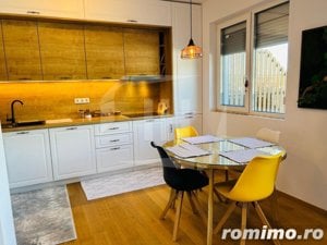 Apartament modern, finisat si mobilat, garaj, terasa 42 mp - imagine 2