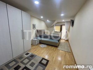 Casa individuala 4 camere 135 mpu garaj pivnita teren 588 mp Sura Mare - imagine 5